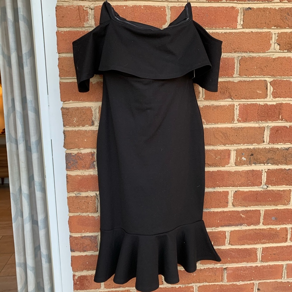 Brand new, bodycon black midi dress with flare